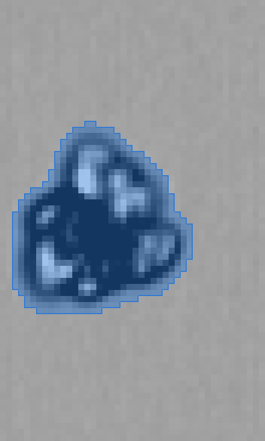 The same frame segmented by traditional thresholding and watershed